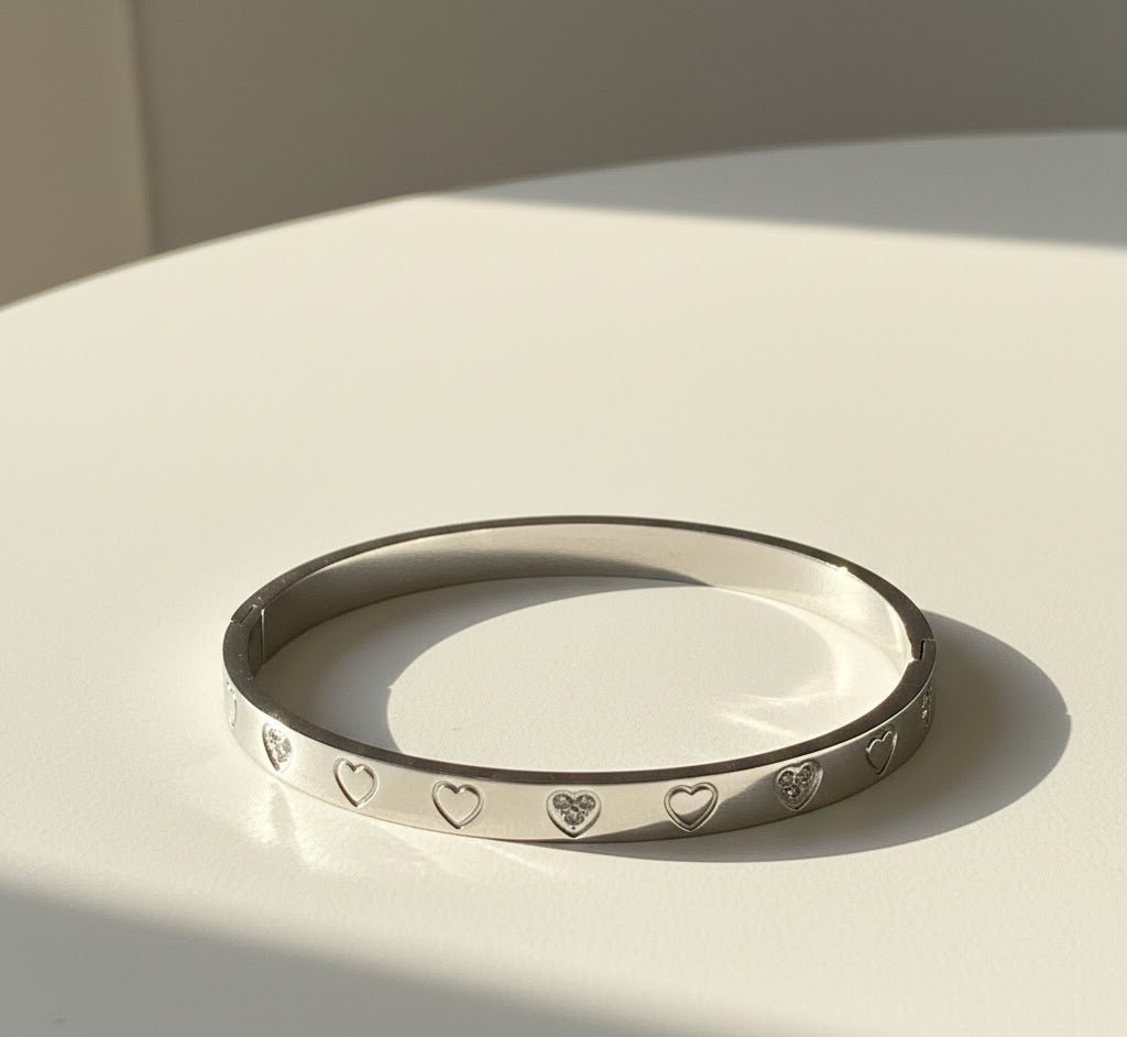 Heart Engraved Silver Bangle