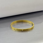 Heart Engraved Silver Bangle